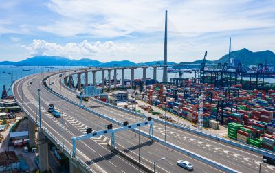 Colorful containers in container terminal, trade Industry Hong Kong China. Top view drone aerial shot.